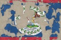 Belize flag depicted in paint colors on old obsolete messy concrete wall closeup. Textured banner on rough background