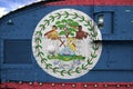 Belize flag depicted on side part of military armored tank closeup. Army forces conceptual background
