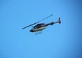 Bell 206 helicopter in flight Royalty Free Stock Photo