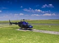 Bell 407 Helicopter Parked on Helipad Royalty Free Stock Photo