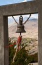 Bell against mountains