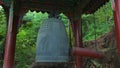 A Bell in buddist monastery in green park in South Korea. Sunny day.