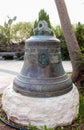 Bell donated by parishioners in courtyard of Greek Orthodox mona Royalty Free Stock Photo