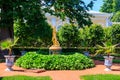 Bell fountain with a sculptural group Bacchus with a satyr near Monplaisir palace in lower park of Peterhof in St. Petersburg Royalty Free Stock Photo