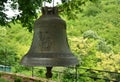 Bell in front of the church of St. John the Baptist