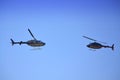 Bell-206 helicopters facing each other