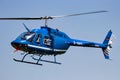 Bell 206 JetRanger helicopter with passengers about to land at Ahlen-Nord heliport. Germany - June 5, 2016 Royalty Free Stock Photo