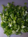 Bell pepper pieces. Capsicum cut into many pieces. Green bell peppers. Royalty Free Stock Photo