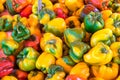 Bell peppers in different colors at a market Royalty Free Stock Photo