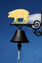Bell with piglet Royalty Free Stock Photo