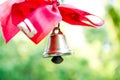 Bell with a ribbon. Last call. A bell with a red ribbon. Spring holiday. School years. Graduation. School bells on the background