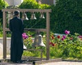 The bell ringer ringing the church bells. Royalty Free Stock Photo