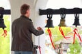 The bell ringer ringing the church bells. Royalty Free Stock Photo