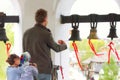 The bell ringer ringing the church bells. Royalty Free Stock Photo