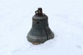 Bell in the snow .