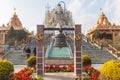 Bell stand in front of The statue of Lord Shiva in construction area at Siddhesvara Dhaam in Namchi. Sikkim, India Royalty Free Stock Photo