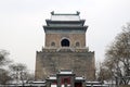 bell tower in beijing city in snowing