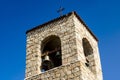 Bell Tower and Bell, Colourful Flags and Blue Sky, the Church of Saint Antonio of Padua in Baia Sardinia, & Blue Sky. Baia Sardini