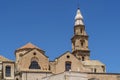 The bell tower of Cathedral Basilica of Maria Santissima della Madia in Monopoli, Bari, Puglia, Italy Royalty Free Stock Photo