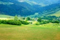 Bell tower and cemetery and mountain landscape in slovakia. Royalty Free Stock Photo