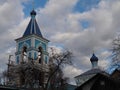 Bell tower and Church against the sky