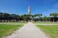 The bell tower of the church of Arezzo, Tuscany, above a public Royalty Free Stock Photo