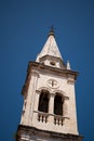 Bell tower at the Church of the Assumption of the Blessed Virgin Mary in Jelsa on the island of Hvar in Croatia Royalty Free Stock Photo