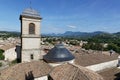 Bell tower of the church , over the roofs of the city of Crest