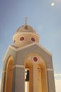 Bell tower of a church at sunset, Santorini island, Greece Royalty Free Stock Photo