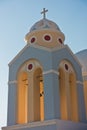 Bell tower of a church at sunset, Imerovigli village, Santorini island Royalty Free Stock Photo