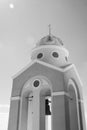 Bell tower of a church at sunset, Santorini island, Greece Royalty Free Stock Photo