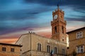 Bell tower and city hall of Pienza Tuscany Italy sunset or sunrise