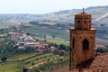 Bell tower and country landscape of Marchigian hills