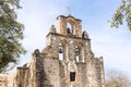 The Bells of Mission Espada set under stone arches with cross, San Antonio, Texas Royalty Free Stock Photo