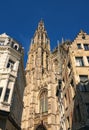 Bell tower with golden watch of the Cathedral of Our Lady. Royalty Free Stock Photo