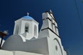 Bell Tower And Main Facade Of The Beautiful Church Of Pyrgos Kallistis On The Island Of Santorini. Travel, Cruises, Architecture, Royalty Free Stock Photo