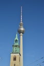 The bell tower of St. Mary`s Church and Berlin TV tower