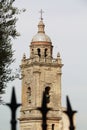 Bell tower of the Mayor church of Medina Sidonia behind the gates, in Spain Royalty Free Stock Photo