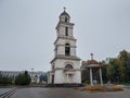The bell tower near the Metropolitan Cathedral Nativity of the Lord with the view to the Triumphal Arch in Chisinau, Moldova. Royalty Free Stock Photo