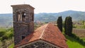 The bell tower of an old Romanesque church in the Venetian hills, Italy Royalty Free Stock Photo