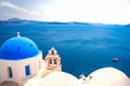 Bell tower of an orthodox church at Santorini, Greece. Honeymoon summer aegean cycladic background. Royalty Free Stock Photo