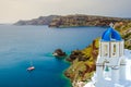 Bell tower of an orthodox church at Santorini, Greece. Honeymoon summer aegean cycladic background. Royalty Free Stock Photo