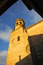 Bell tower of renaissance cathedral of Baeza at sunset, Spain Royalty Free Stock Photo