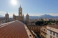 The bell tower and the roof of Palermo Cathedral with mountains at golden hour Royalty Free Stock Photo