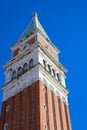 bell tower of Saint Mark in the square of Venice in Italy with blue sky