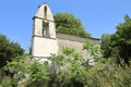 The bell tower of Saint Spiridon Church in the desert mountain village of The Old Perithia Ano Palea Perithia, Corfu Island, Gre Royalty Free Stock Photo