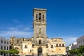 Bell tower of Santa Maria de la Asuncion church in Arcos de la Frontera, Spain Royalty Free Stock Photo