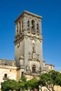 Bell tower of Santa Maria de la Asuncion church in Arcos de la Frontera, Spain Royalty Free Stock Photo