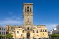 Bell tower of Santa Maria de la Asuncion church in Arcos de la Frontera, Spain Royalty Free Stock Photo
