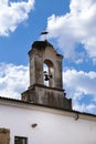 Bell tower with a stork nest in Trujillo town